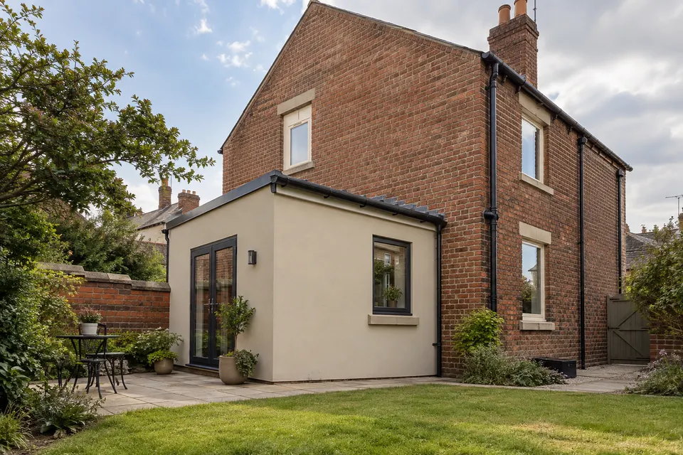 Illustrative property showing how a rendered elevation meets existing materials